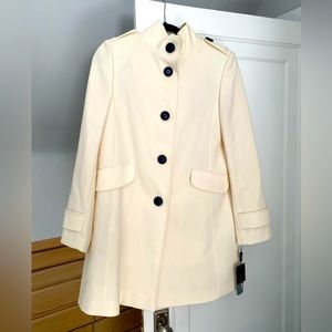 Gorgeous- extremely flattering- cream coat- perfect for springtime
